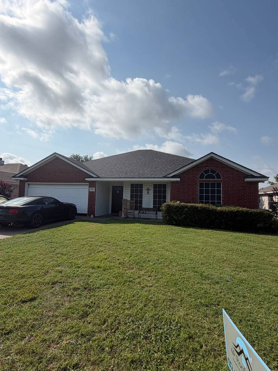 Completed roof replacement in Cleburne, TX with Onyx Black shingles