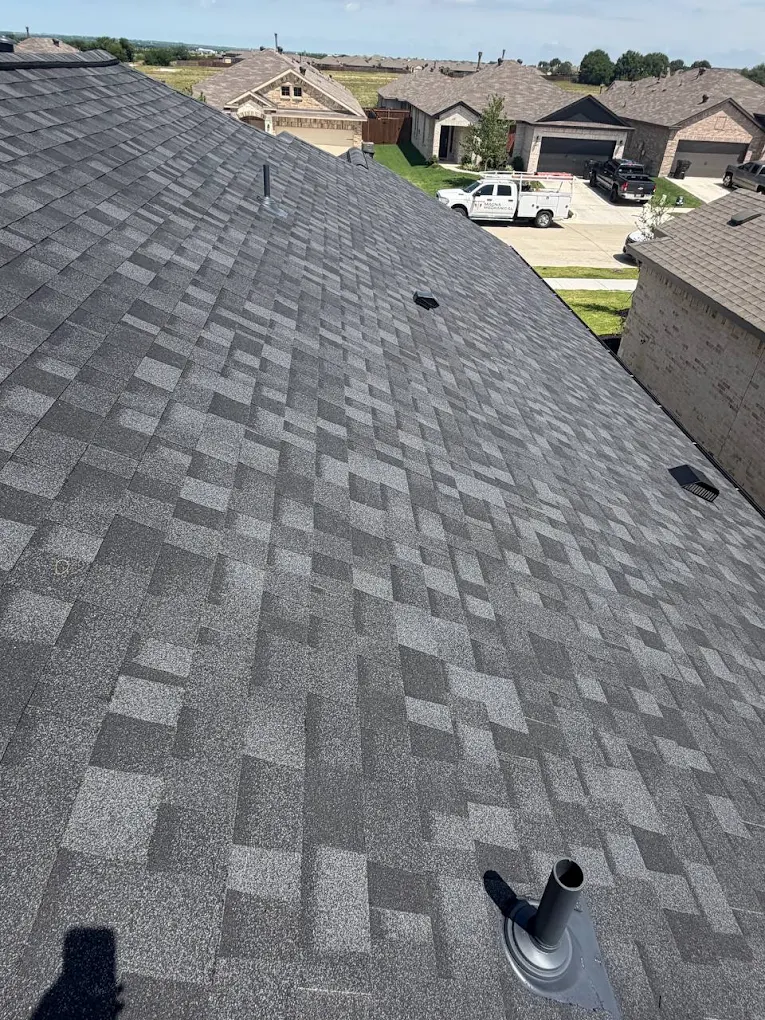 Finished shingle roof with vent boot detail